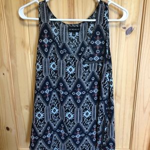 High low sleeveless blouse